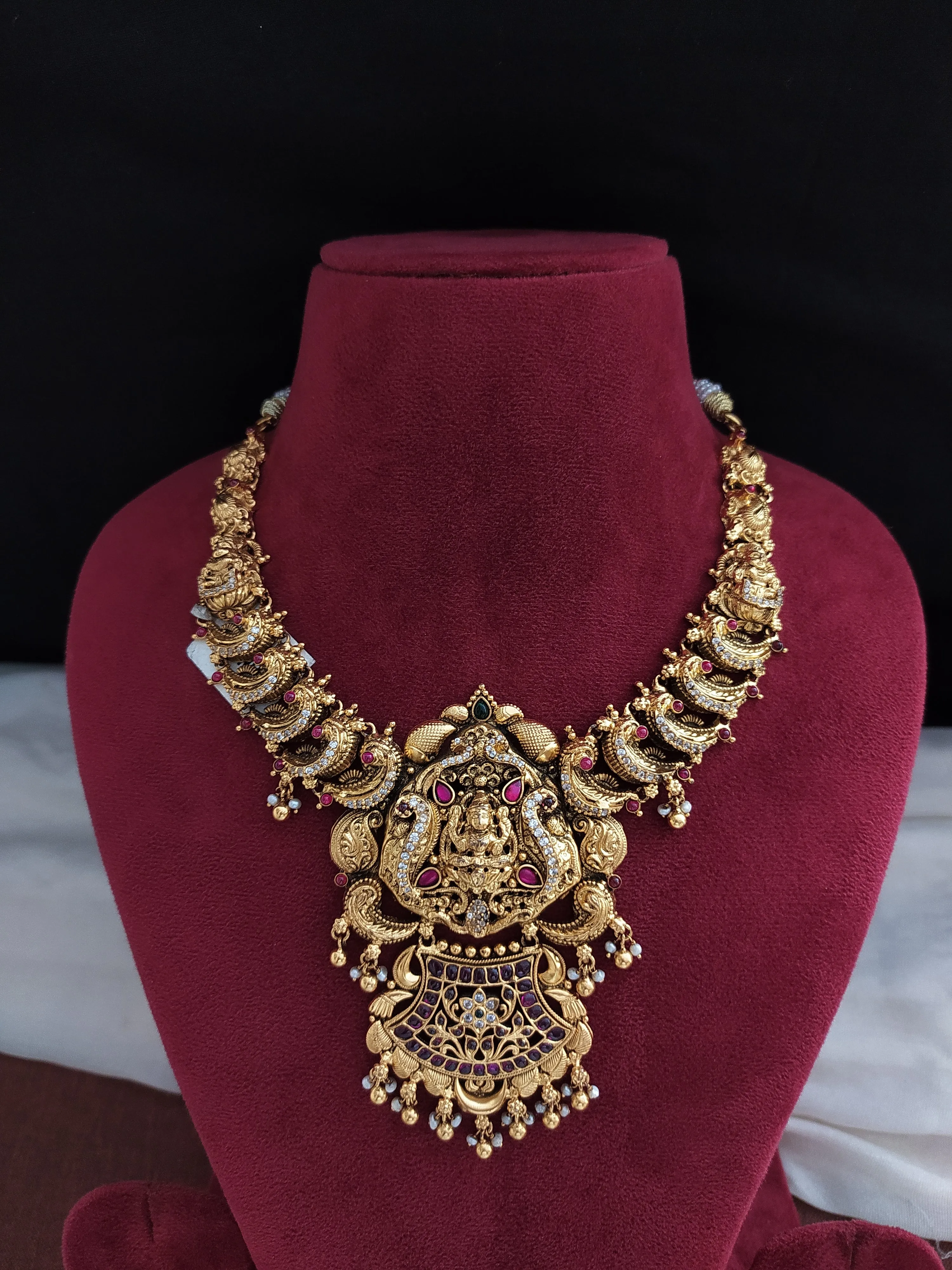 Antique Silver Polish Lakshmi Design Necklace With Golden Danglings In Ruby Stone