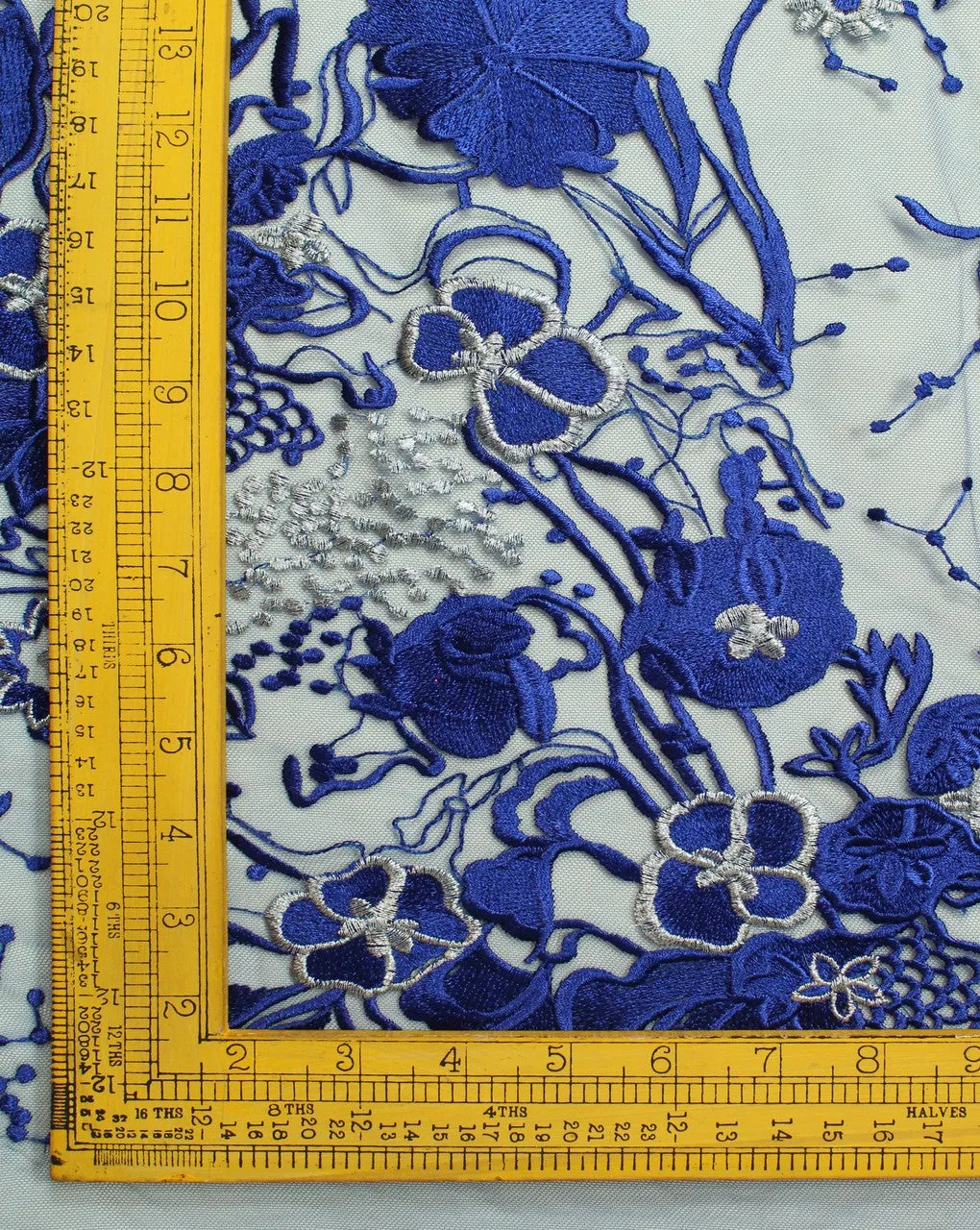 Blue And Silver Floral Polyester Net Embroidered Fabric