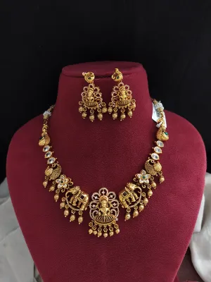 "Antique Lakshmi Necklace Set with Trending Zircon Stones and Nagas Work"