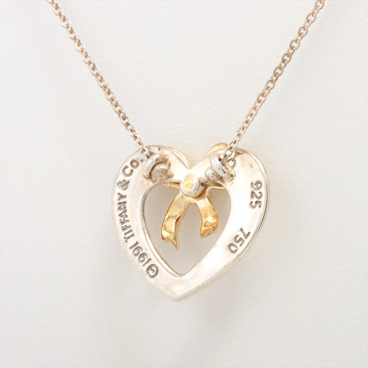 Tiffany & Co. Heart Bow Gold and Silver Necklace